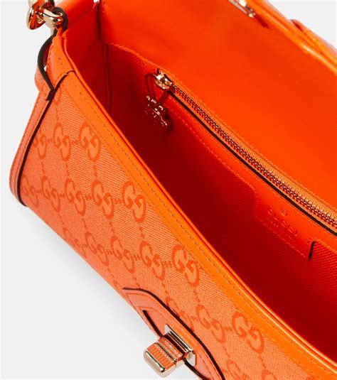 gucci tasche klein orange|Gucci Luce small shoulder bag in orange GG canvas .